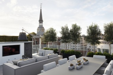 The Brummell Penthouse: Roof terrace with fire pit and television